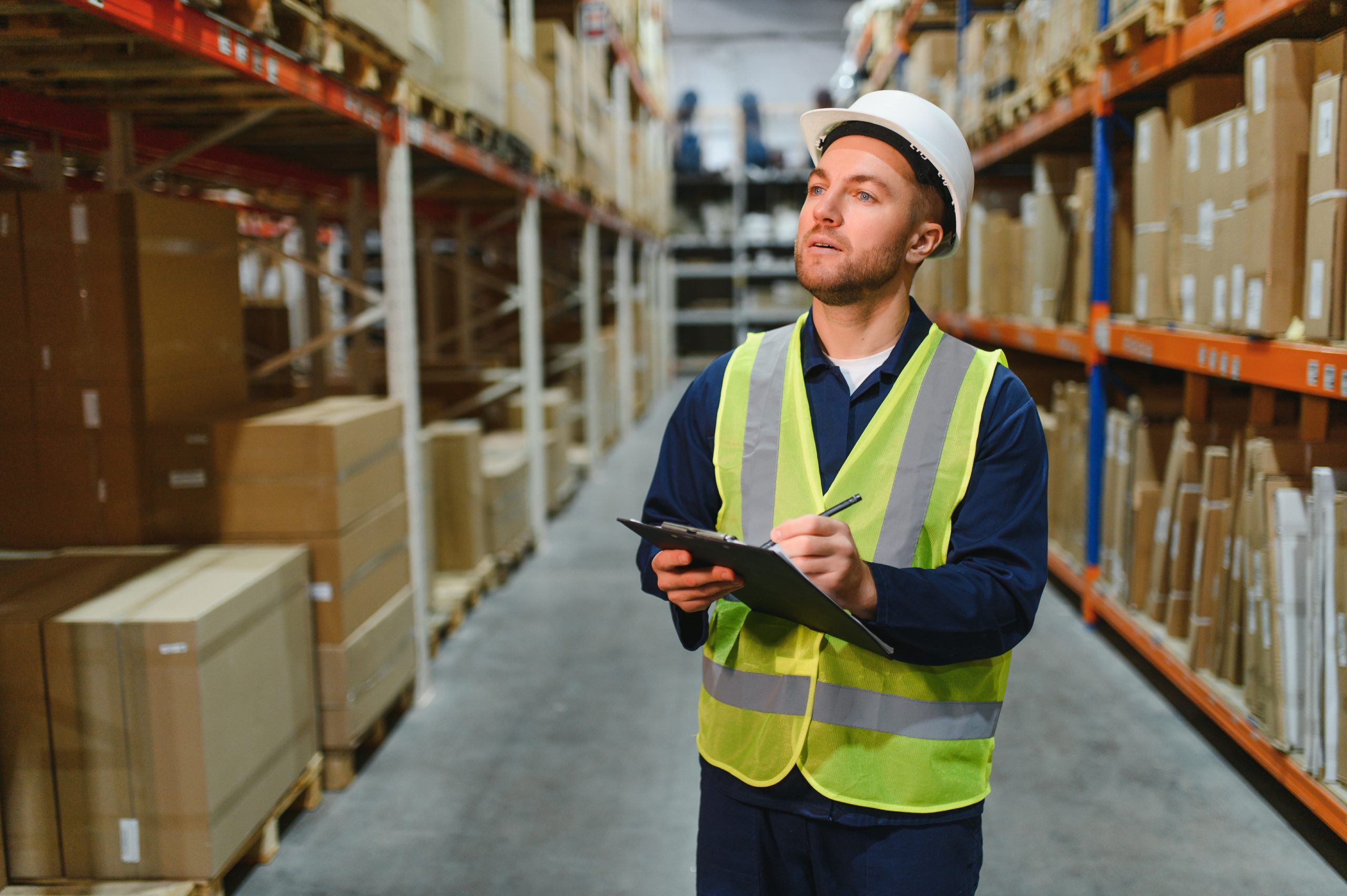 Portrait,Of,Warehouseman,With,Clipboard,Checking,Delivery,,Stock,In,Warehouse.