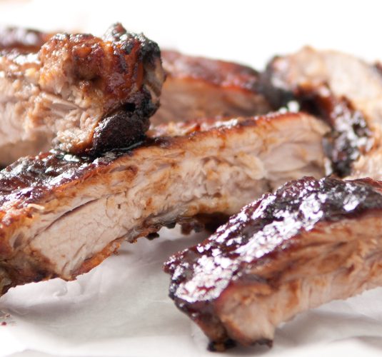 juicy barbeque pork ribs with beer and sauce