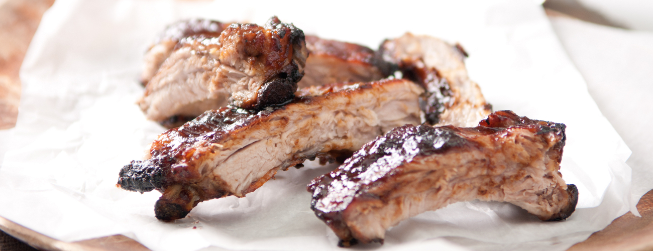 juicy barbeque pork ribs with beer and sauce