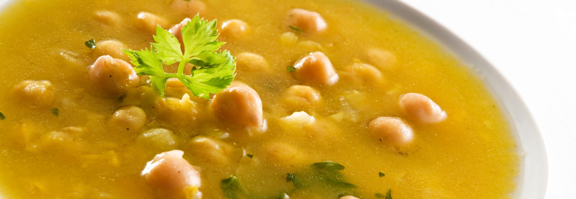 Fresh hot chickpea soup close up shoot