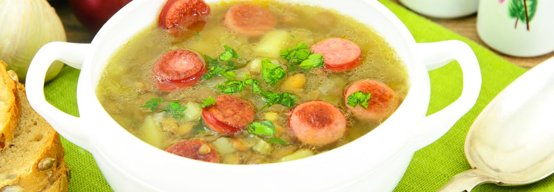 Healthy and Diet Food: Soup with Lentils and Sausage. Studio Photo